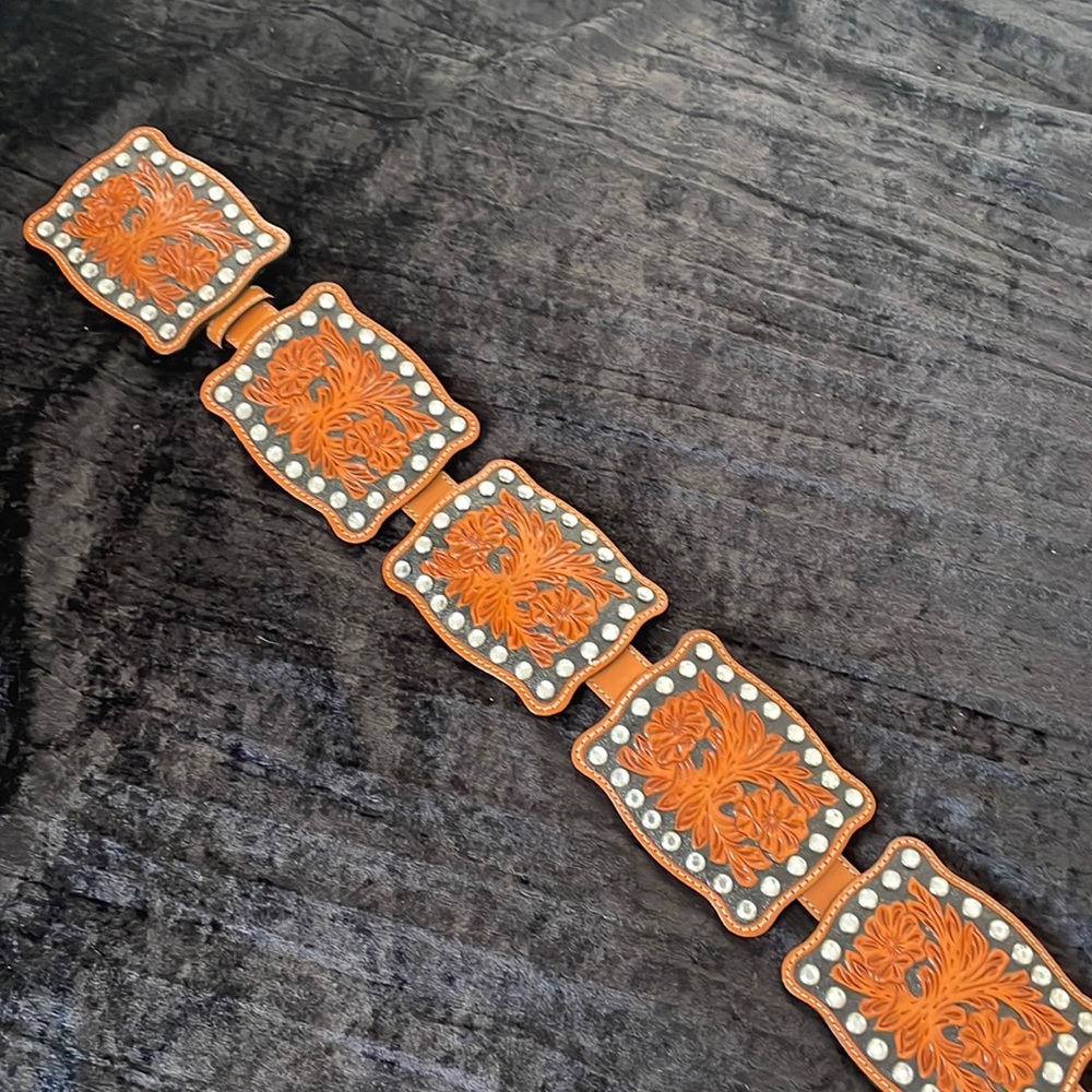 Tooled leather “concho” belt. 7 tooled conchos with bling.  Each concho 4”x3”